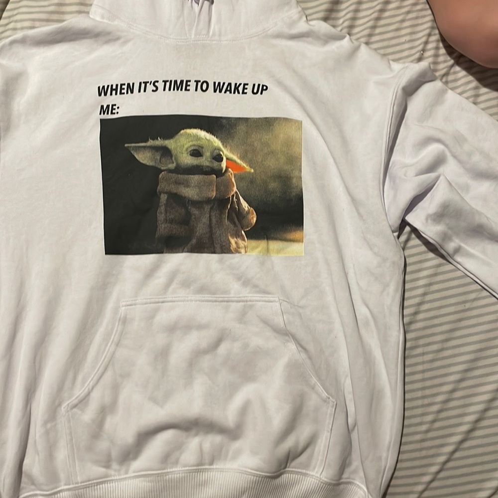 I’m selling this baby Yoda sweatshirt. It’s light but soft.